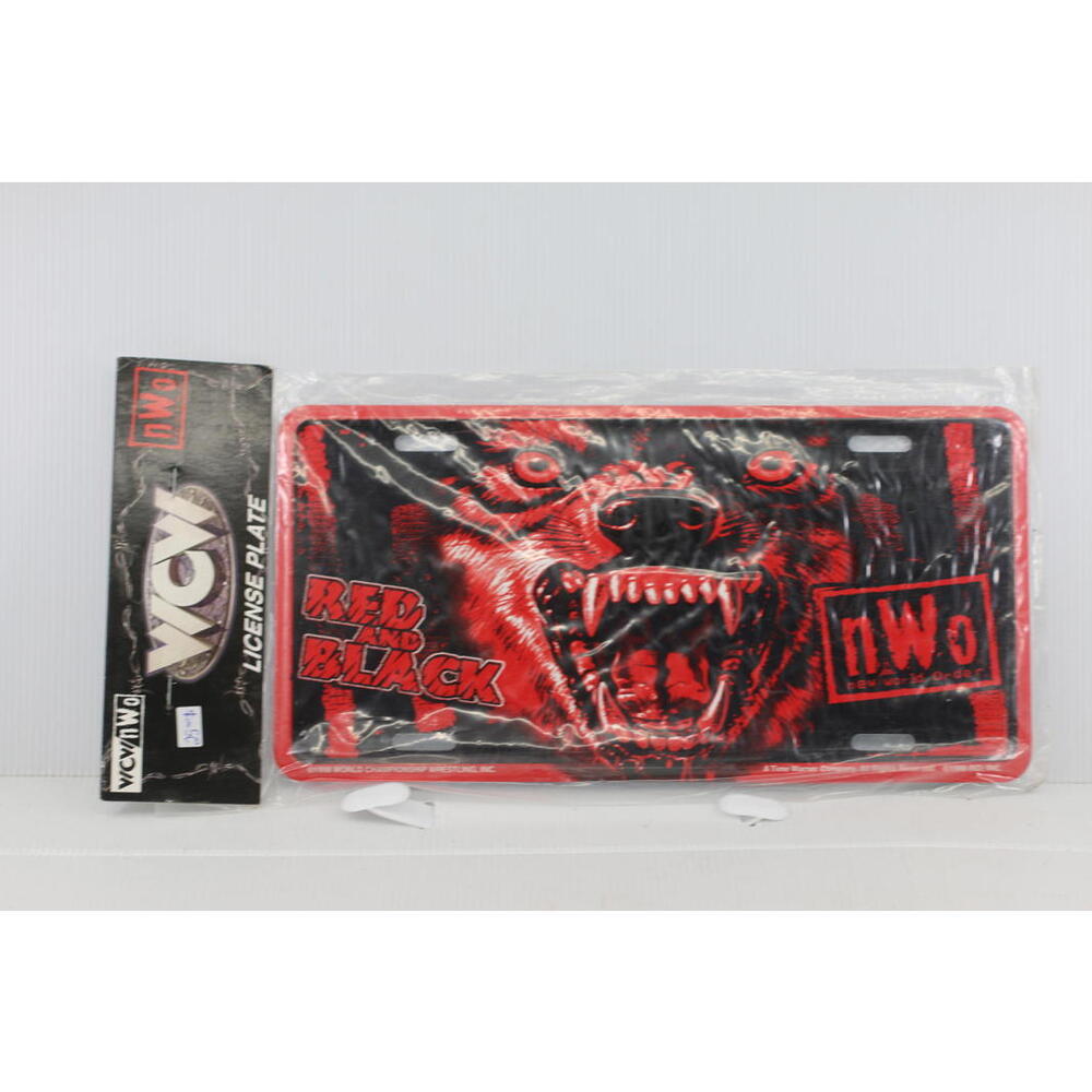 Sealed 1998 WCW New World Order Red & Black Wolf Metal Automobile Vehicle Plate